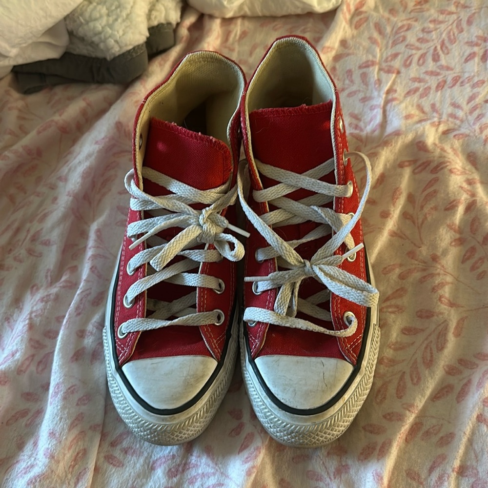 Red All star Converse sneakers.